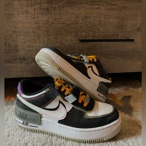 Size 6.5 colorful shadow Nike Air Forces with buckle